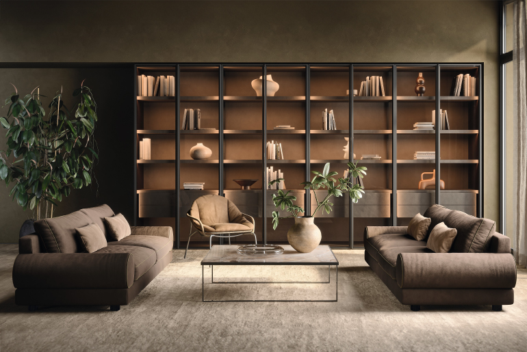 Living Pianca con divano Brando e poltrona Nuvola, tavolino Icaro e sistema libreria Teatro, arredi modulari dal design elegante.
